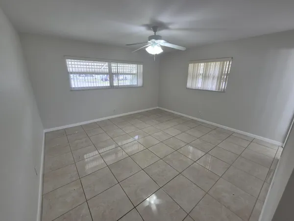 a view of an empty room and window