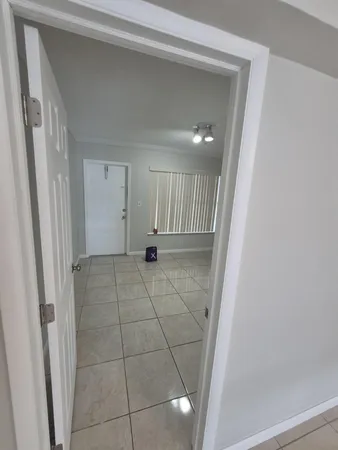 a view of a livingroom with wooden floor
