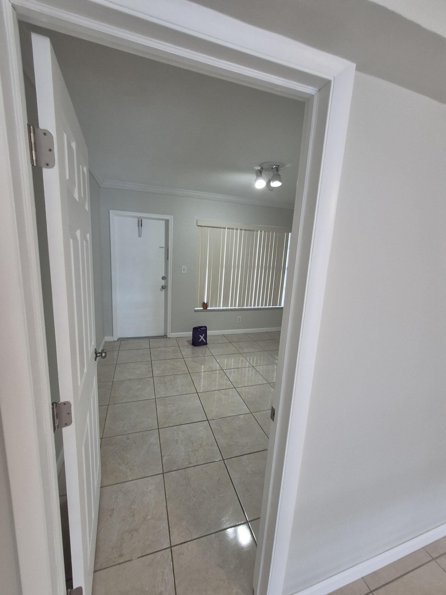 3709 Tyler Street Hollywood, FL 33021 - Photo 13 of 14 a view of a livingroom with wooden floor