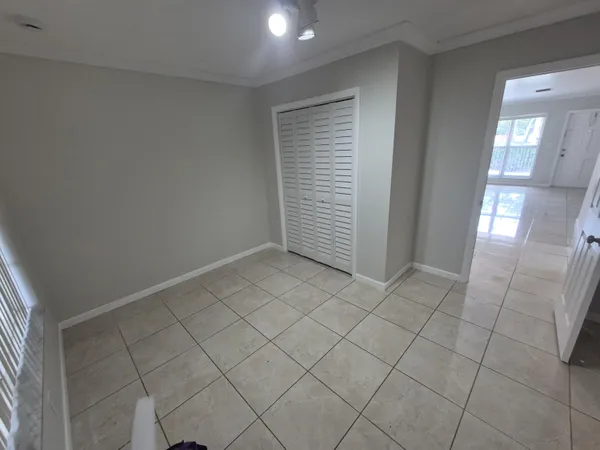 an empty room with windows