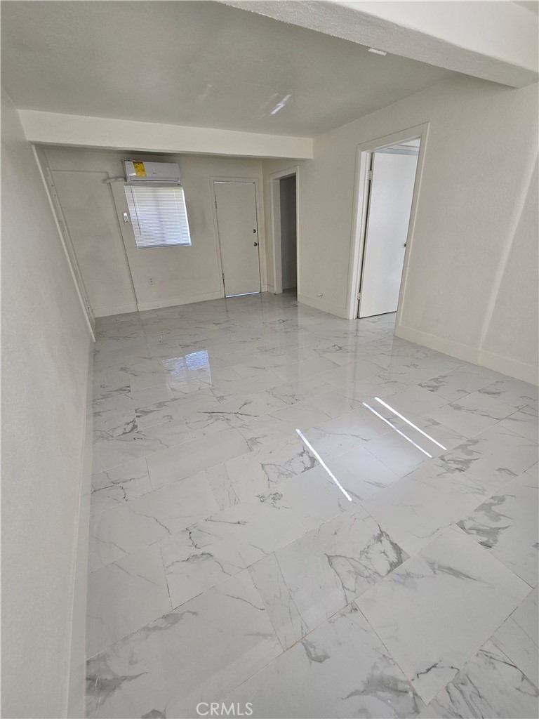 12226 East Valley Boulevard El Monte, CA 91732 - Photo 4 of 7 an empty room with windows