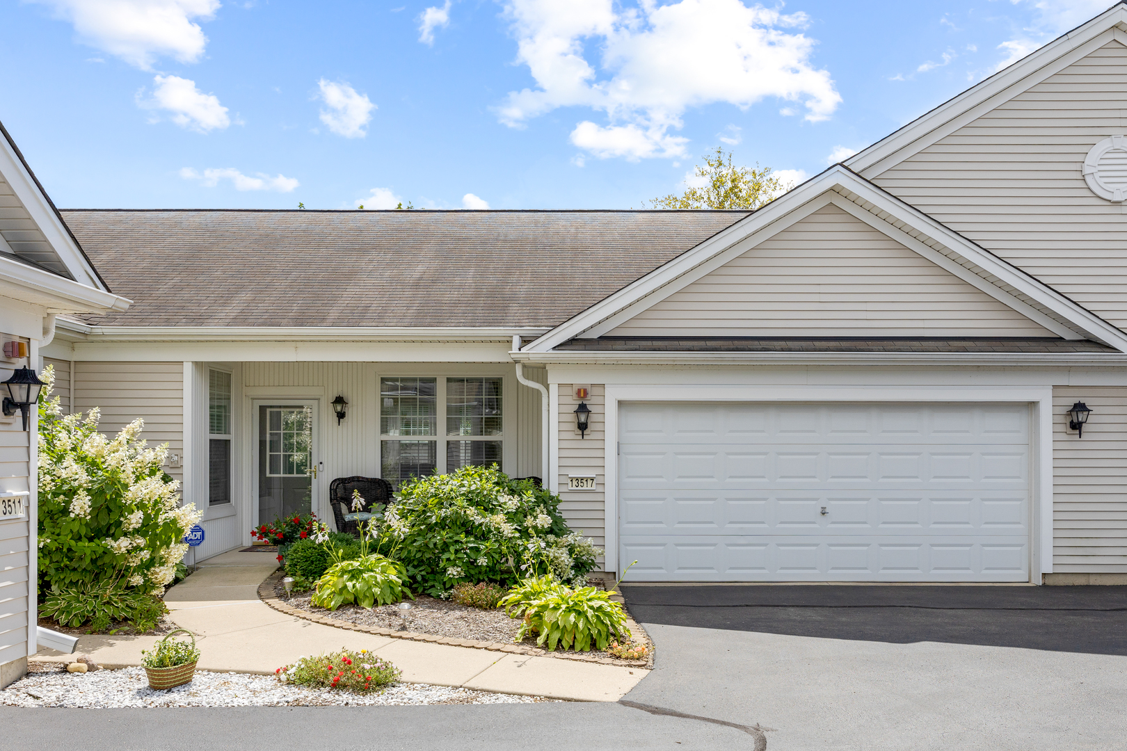 13517 Hemlock Road Huntley, IL 60142 - Photo 1 of 22 a view of a house with potted plants