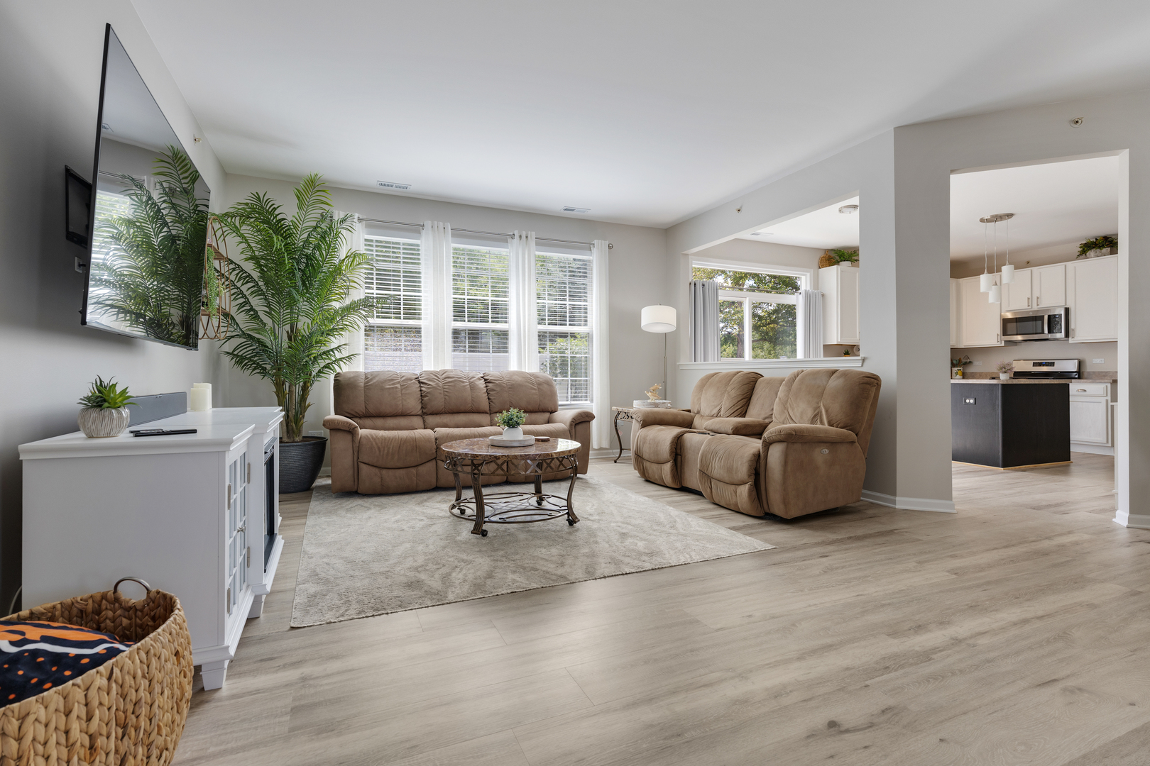 13517 Hemlock Road Huntley, IL 60142 - Photo 6 of 22 a living room with furniture a large window and a wooden floor