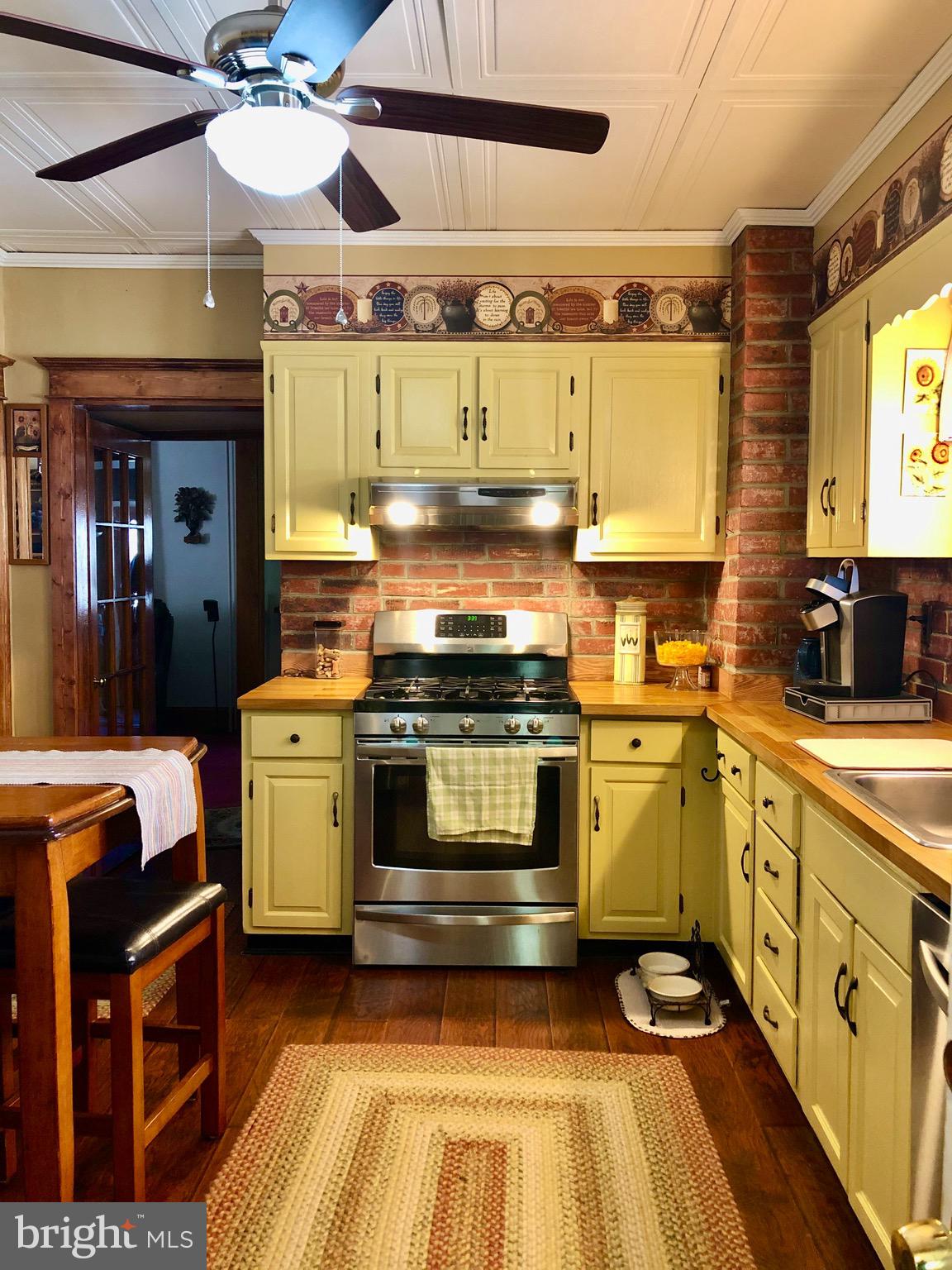 4425 Raspe Avenue Baltimore, MD 21206 - Photo 14 of 33 Kitchen with stainless appliances and table space