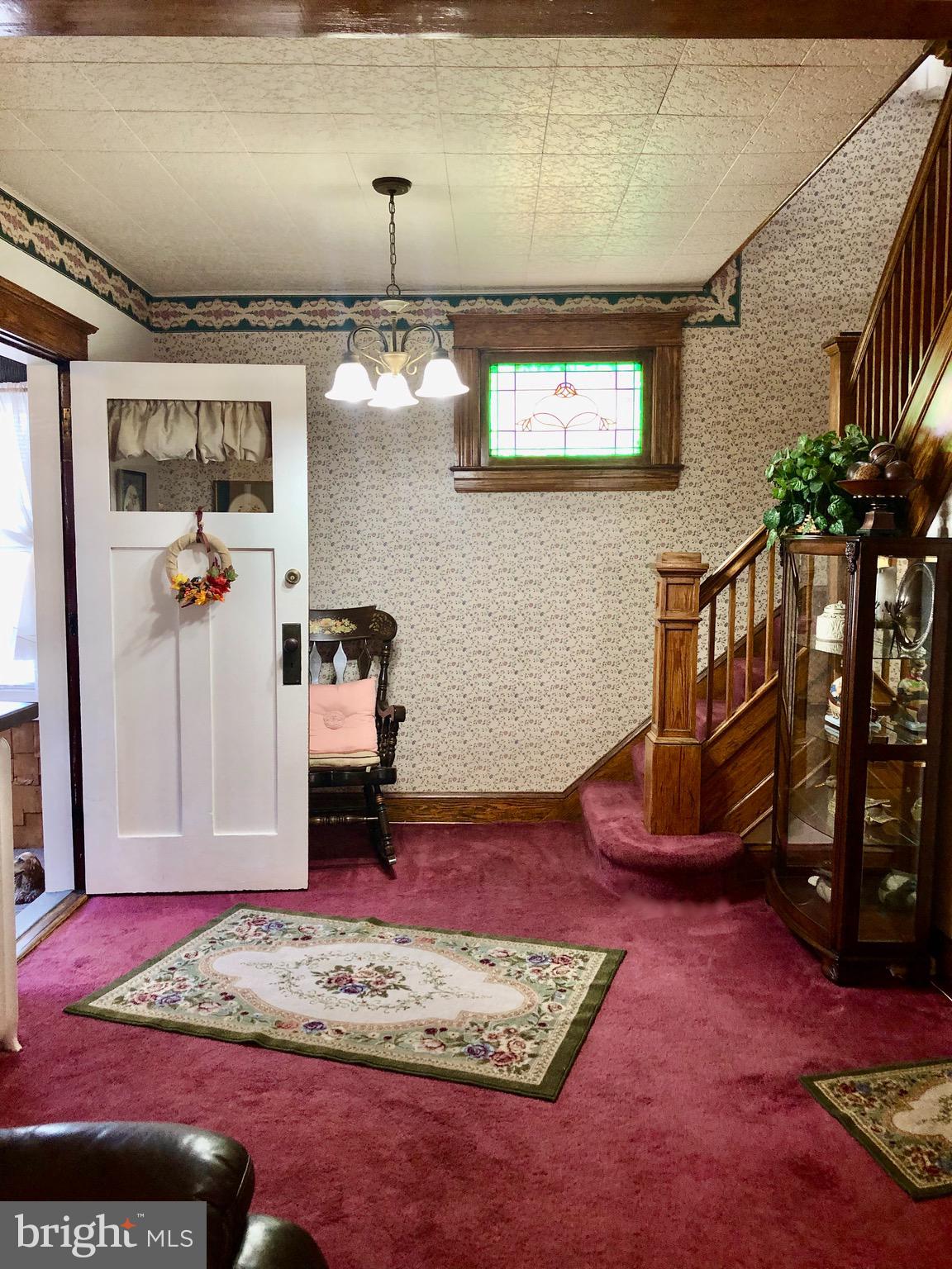 4425 Raspe Avenue Baltimore, MD 21206 - Photo 5 of 33 Grand foyer entrance with stained glass window