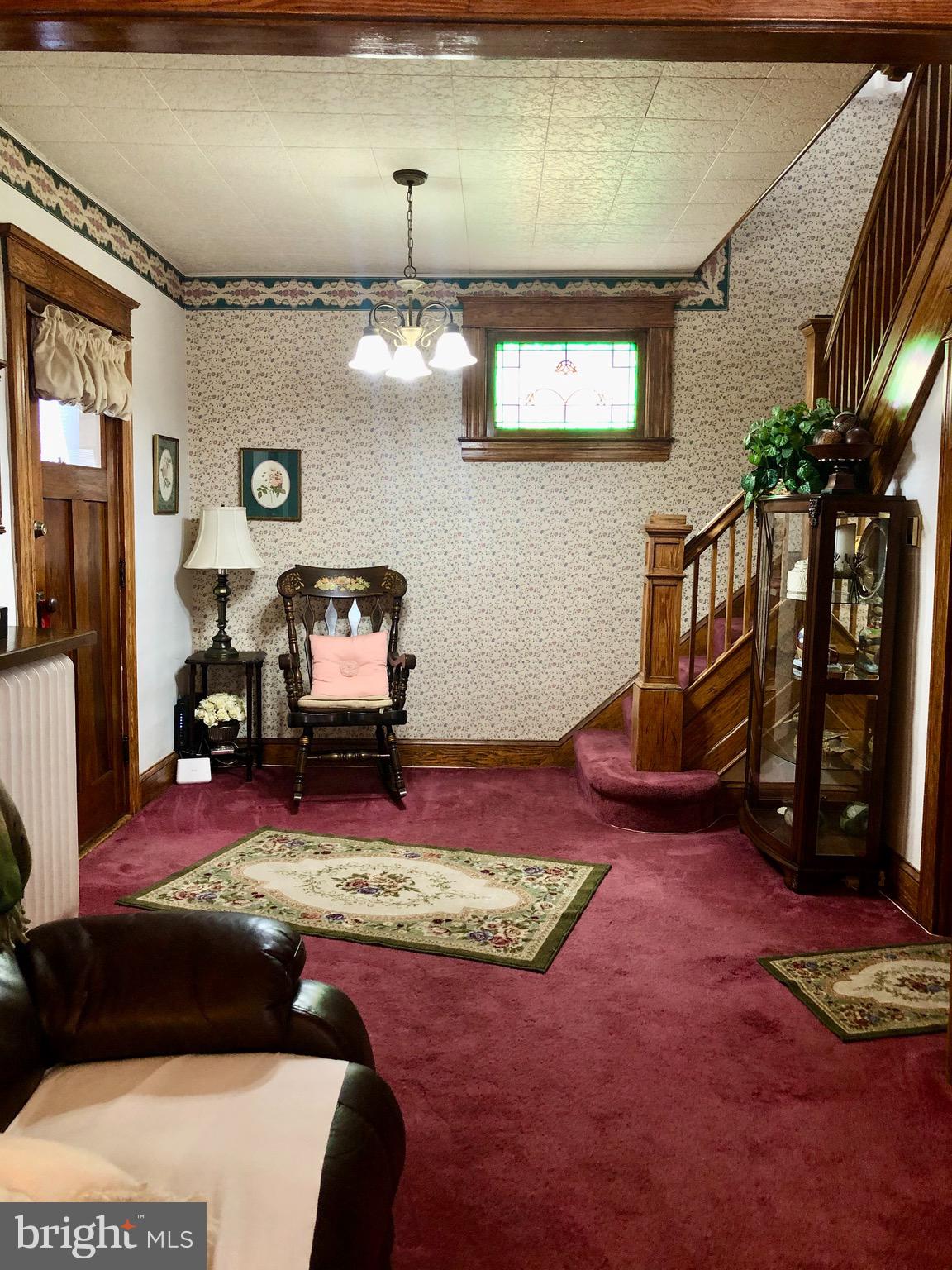 4425 Raspe Avenue Baltimore, MD 21206 - Photo 6 of 33 Grand foyer entrance with stained glass window