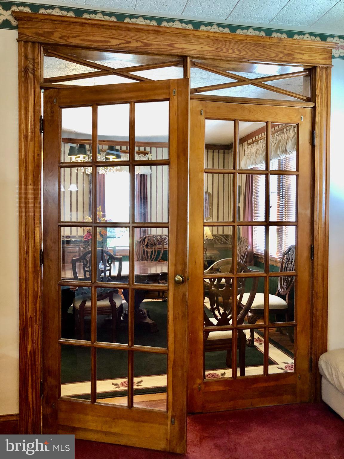 4425 Raspe Avenue Baltimore, MD 21206 - Photo 9 of 33 French doors to the formal dining room