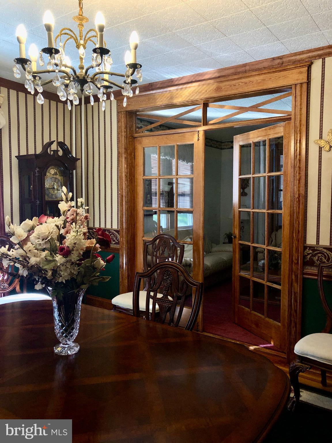 4425 Raspe Avenue Baltimore, MD 21206 - Photo 10 of 33 French doors in the formal dining room
