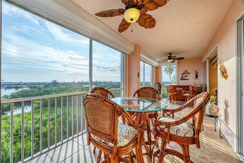 13113 Gasparilla Road, Unit 403 Placida, FL 33946 - Photo 40 of 62 a view of a dining room with furniture window and outside view