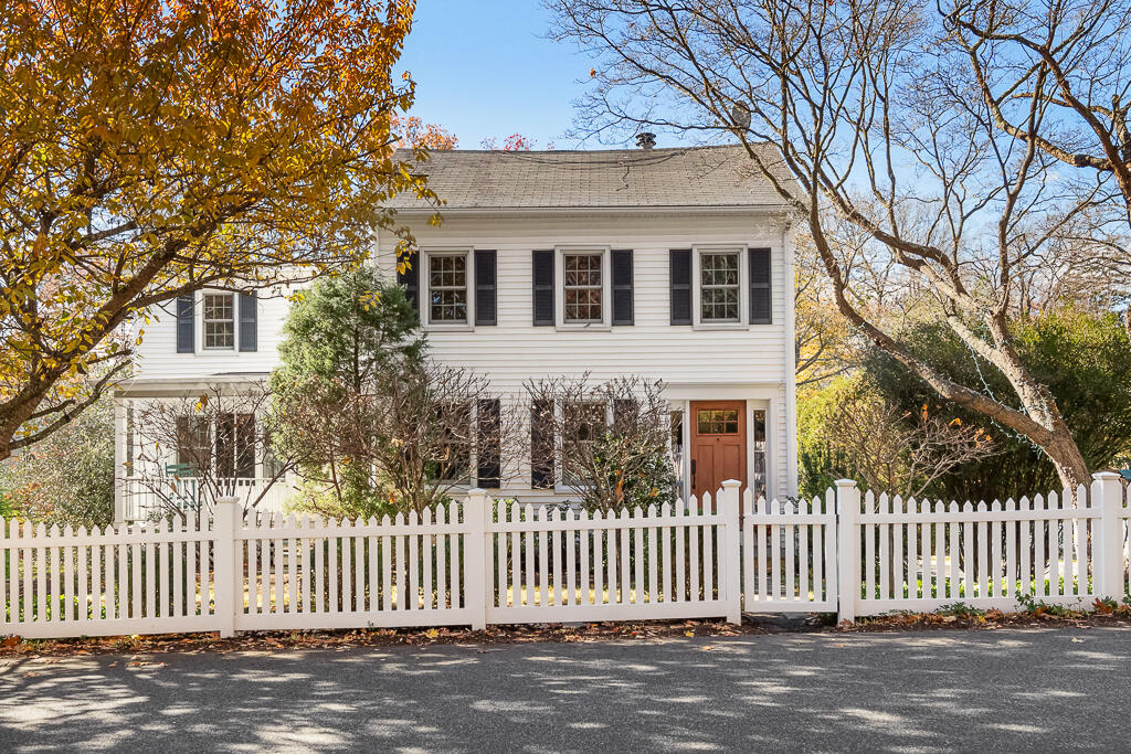 31 Brookside Road Darien, CT 06820 - Photo 1 of 34 a front view of a house with a garden