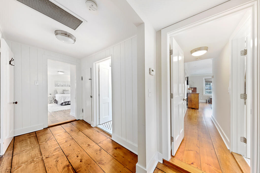 31 Brookside Road Darien, CT 06820 - Photo 23 of 34 a view of a bedroom from a hallway