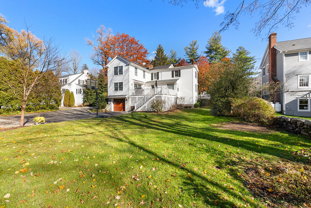 31 Brookside Road Darien, CT 06820 - Photo 29 of 34 a front view of a house with a yard