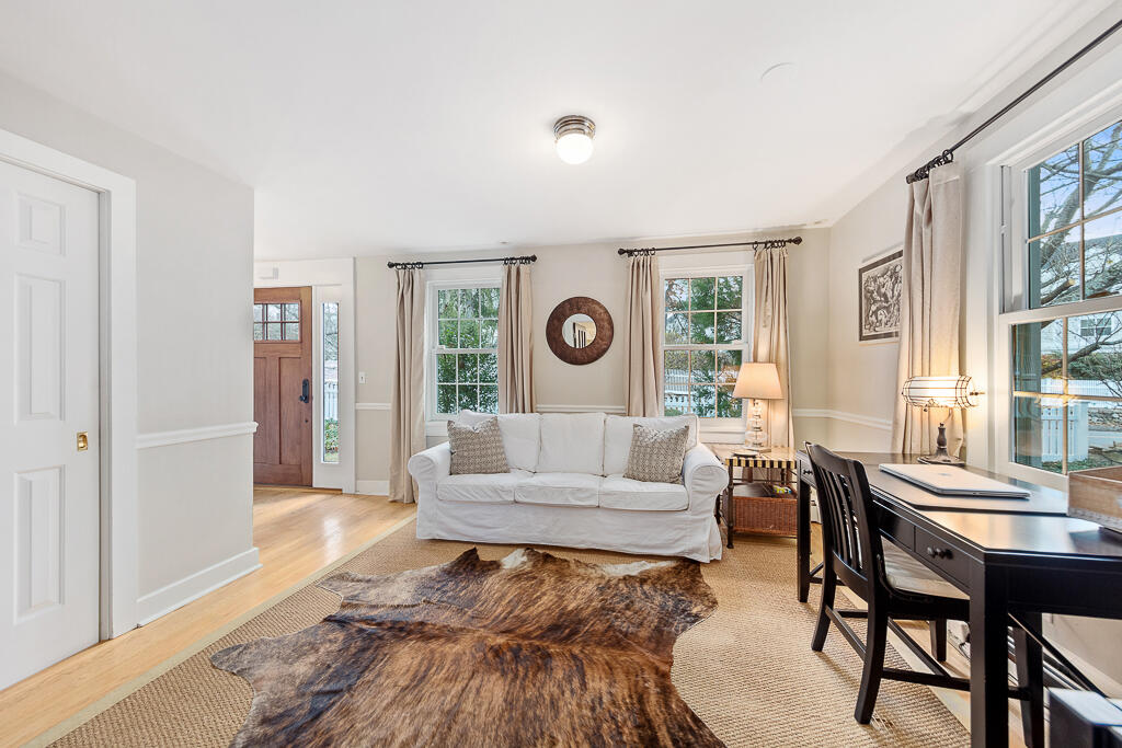 31 Brookside Road Darien, CT 06820 - Photo 4 of 34 a living room with furniture and a large window