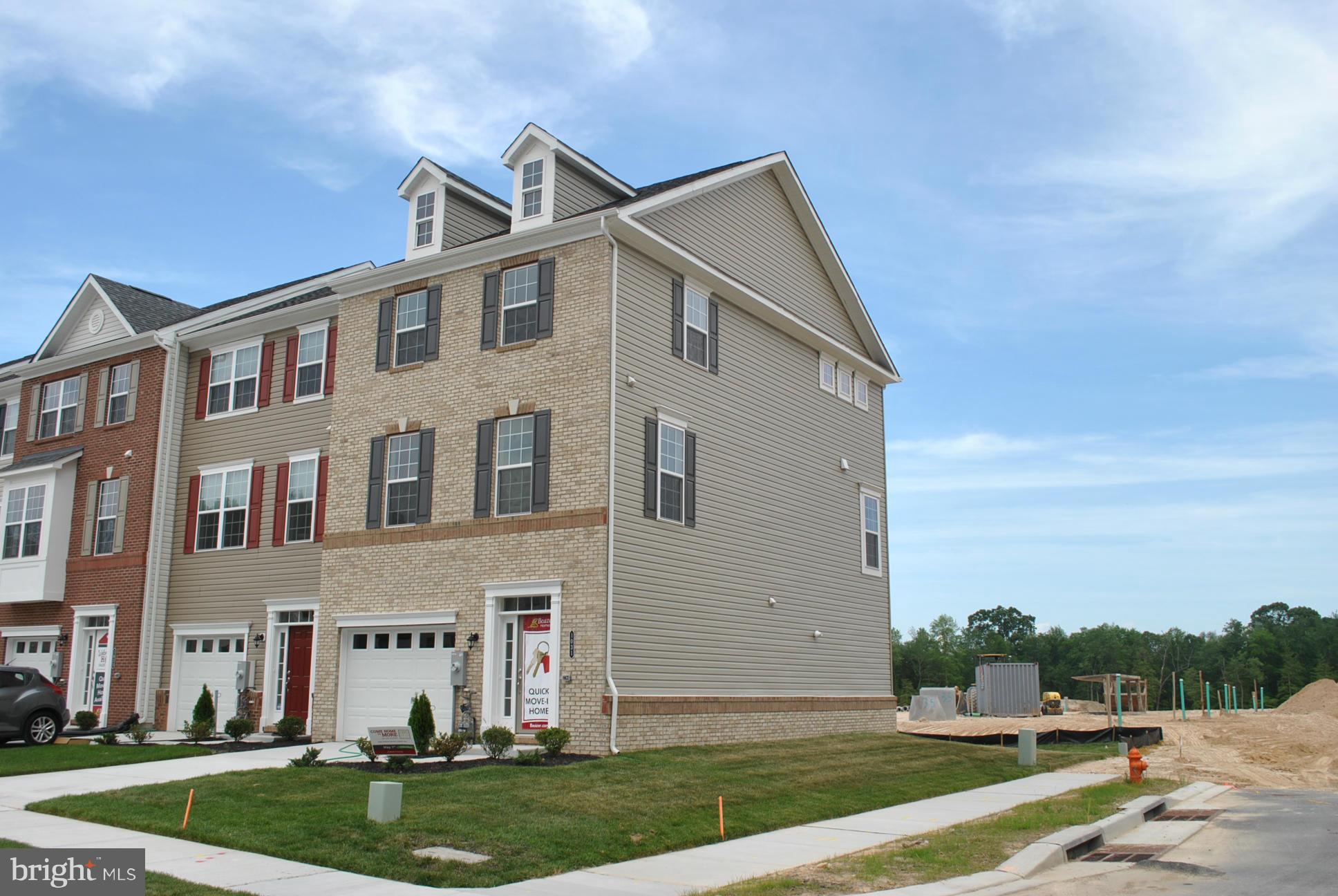 10401 Braddock Run Road Middle River, MD 21220 - Photo 1 of 19 a view of a white house with a yard and table and chairs