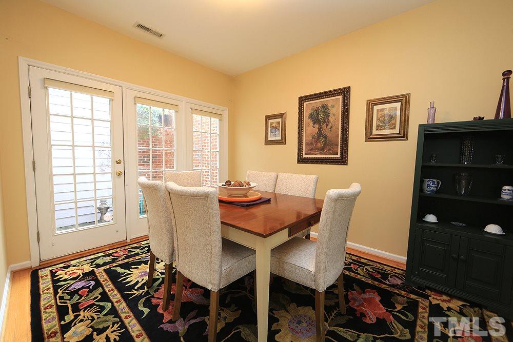 10400 Shadowlawn Drive Raleigh, NC 27614 - Photo 11 of 29 Grand size formal dining that leads out to the sun drenched court yard