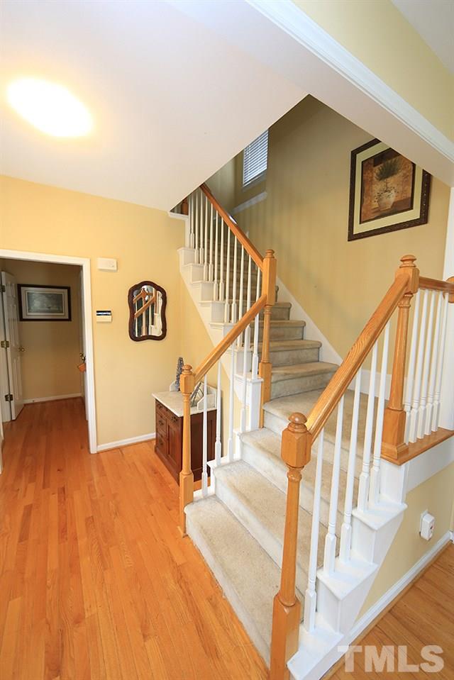 10400 Shadowlawn Drive Raleigh, NC 27614 - Photo 4 of 29 Walk into a foyer that leads to family room and upstairs. Half Bath to the left, storage and garage to the left