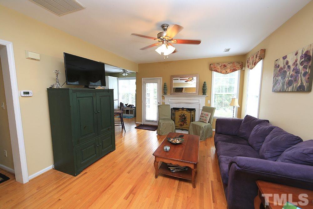 10400 Shadowlawn Drive Raleigh, NC 27614 - Photo 6 of 29 Plenty of space to gather with gas fireplace for those cold days. New HVAC for those Hot Raleigh days. Newer light fixtures and fans