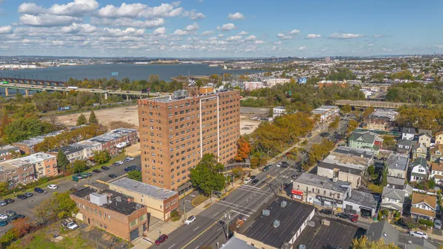 a view of a city with a lake