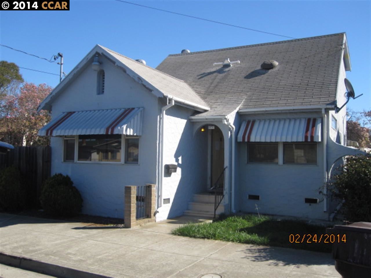 243 Railroad Avenue Rodeo, CA 94572 - Photo 1 of 1 a front view of a house