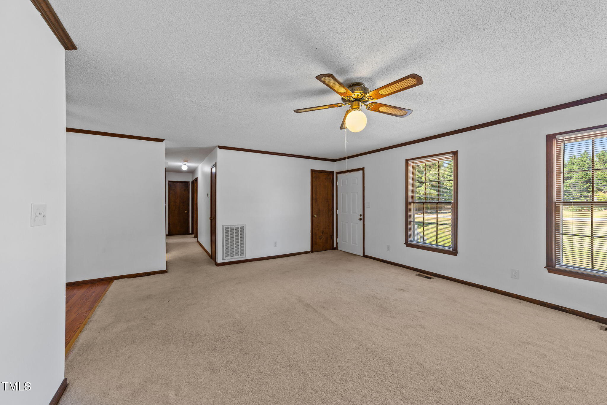 1101 Robinfield Drive Raleigh, NC 27603 - Photo 21 of 48 wooden floor in an empty room with a window