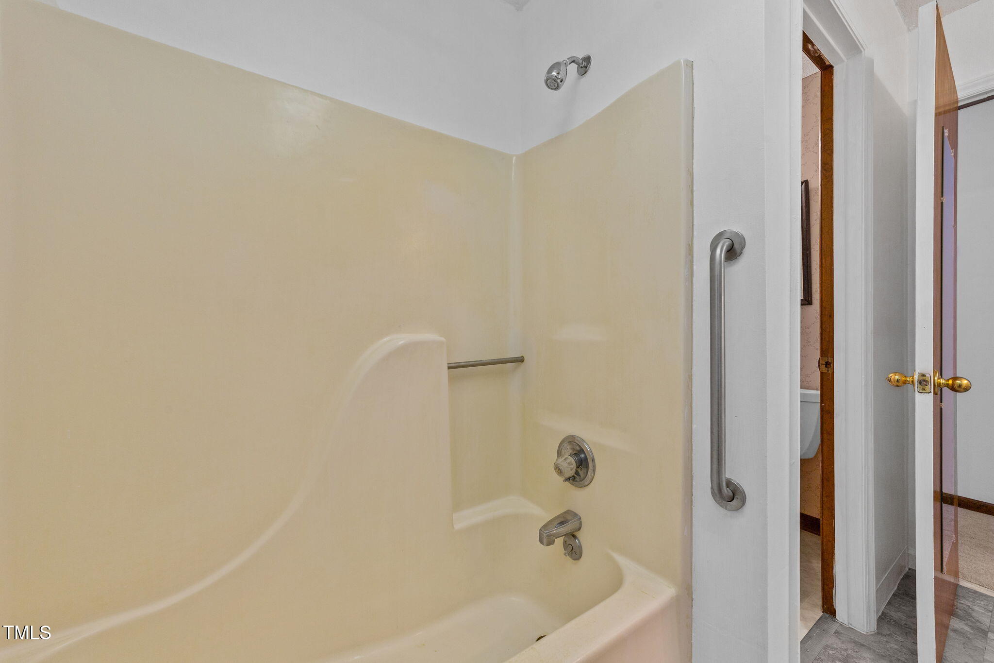 1101 Robinfield Drive Raleigh, NC 27603 - Photo 28 of 48 a bathroom with a bathtub