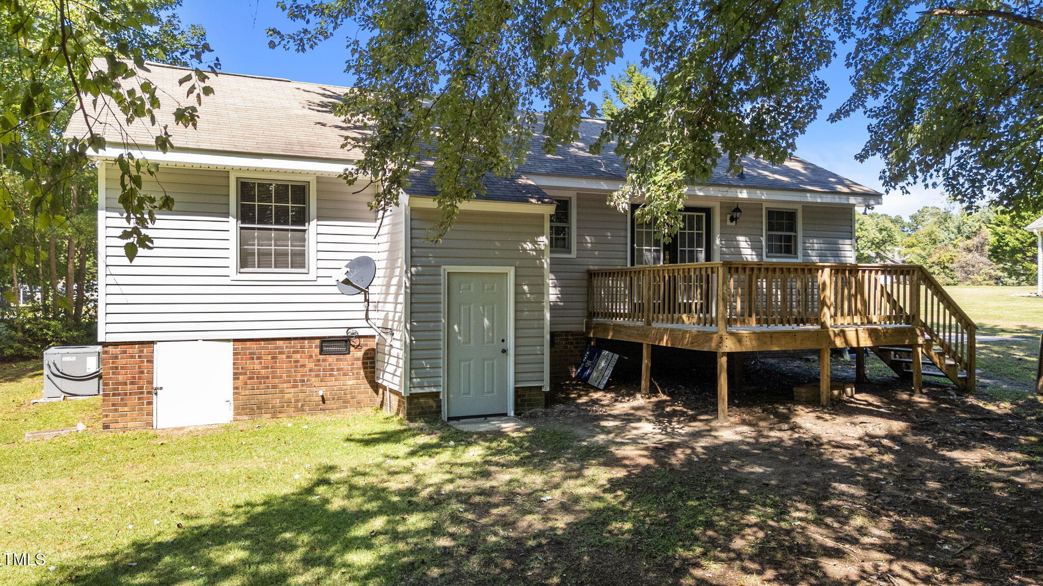 1101 Robinfield Drive Raleigh, NC 27603 - Photo 32 of 48 a front view of a house with a yard