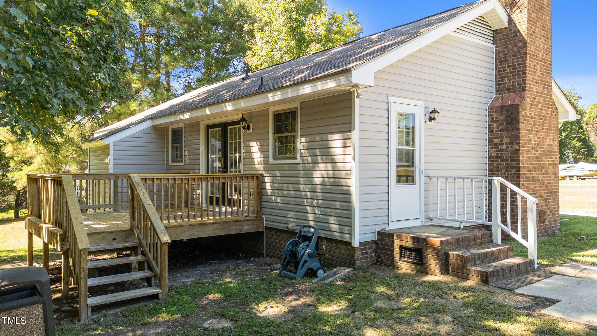 1101 Robinfield Drive Raleigh, NC 27603 - Photo 36 of 48 a front view of a house with a yard