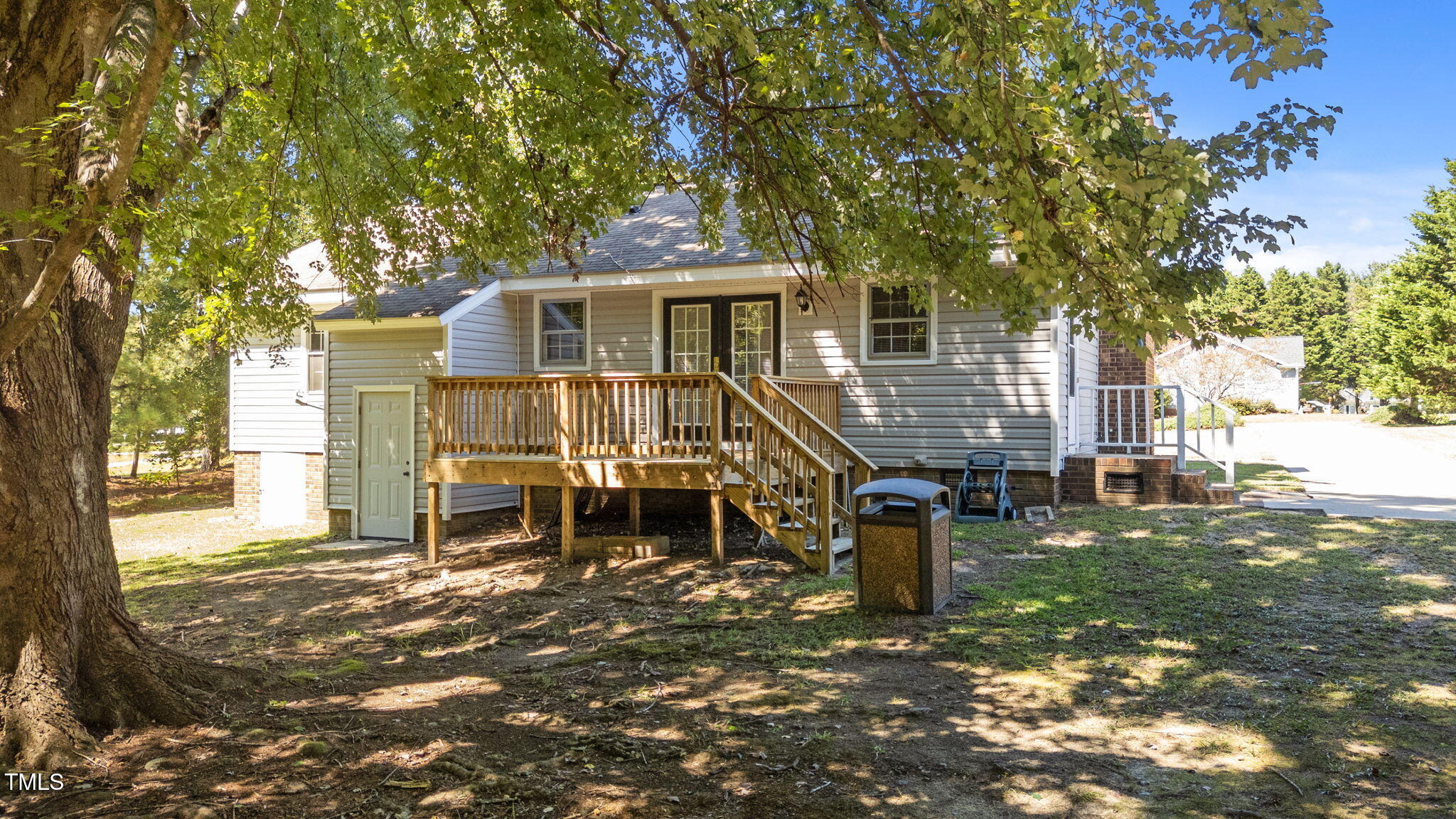 1101 Robinfield Drive Raleigh, NC 27603 - Photo 37 of 48 a front view of a house with a garden