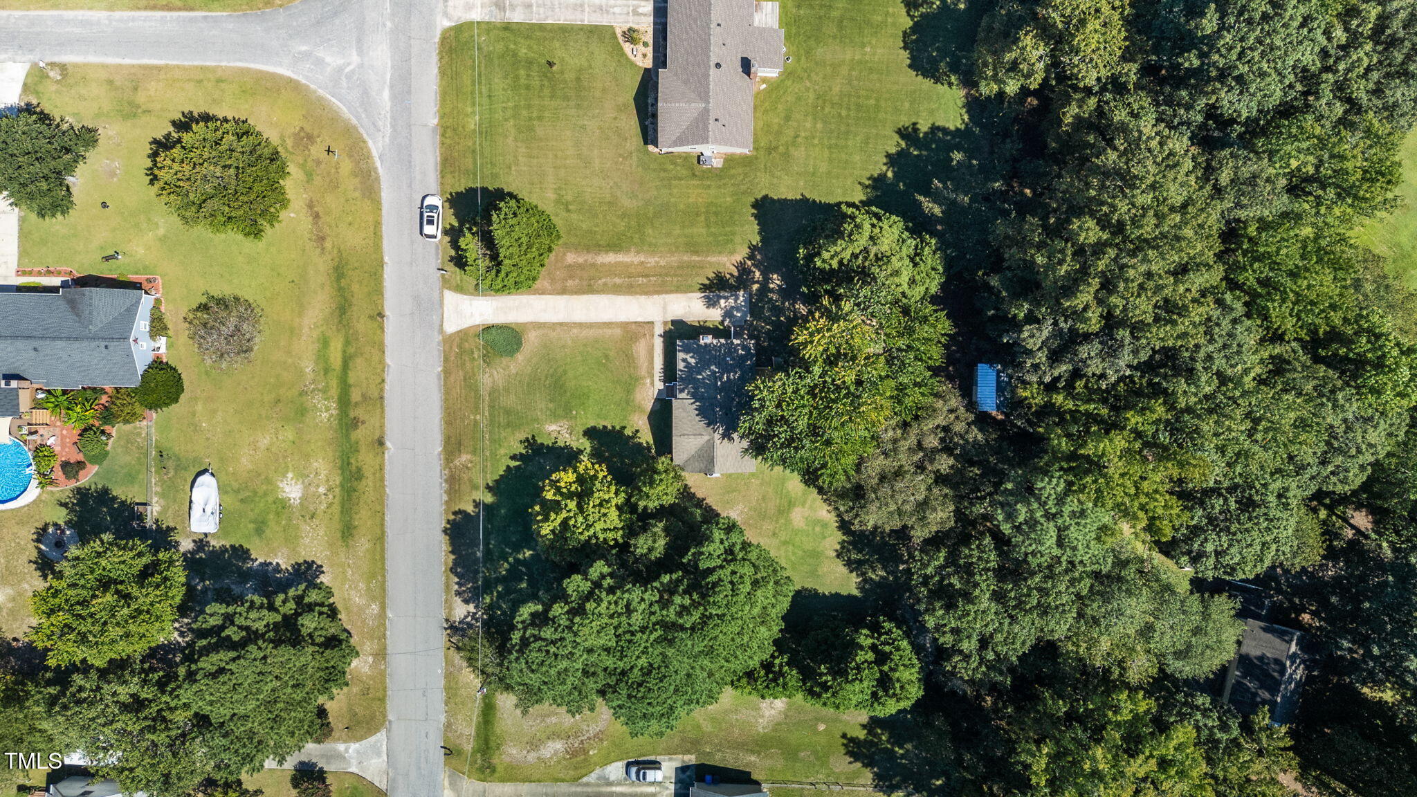 1101 Robinfield Drive Raleigh, NC 27603 - Photo 40 of 48 an aerial view of residential house with outdoor space and trees all around
