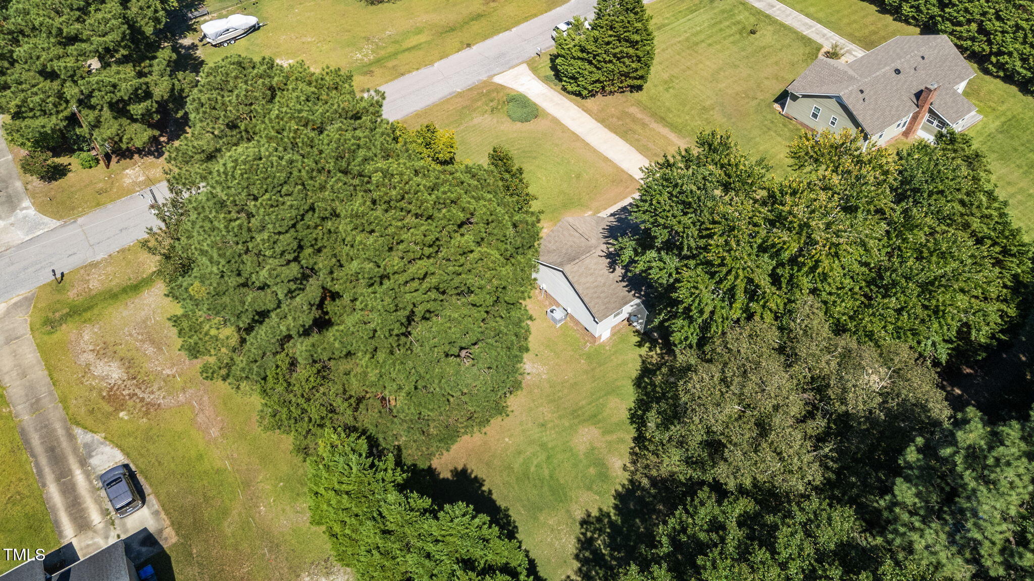 1101 Robinfield Drive Raleigh, NC 27603 - Photo 43 of 48 an aerial view of residential house with pool and garden