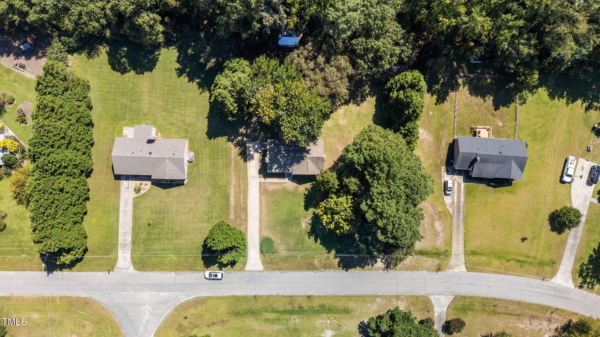 1101 Robinfield Drive Raleigh, NC 27603 - Photo 45 of 48 an aerial view of a house with a swimming pool