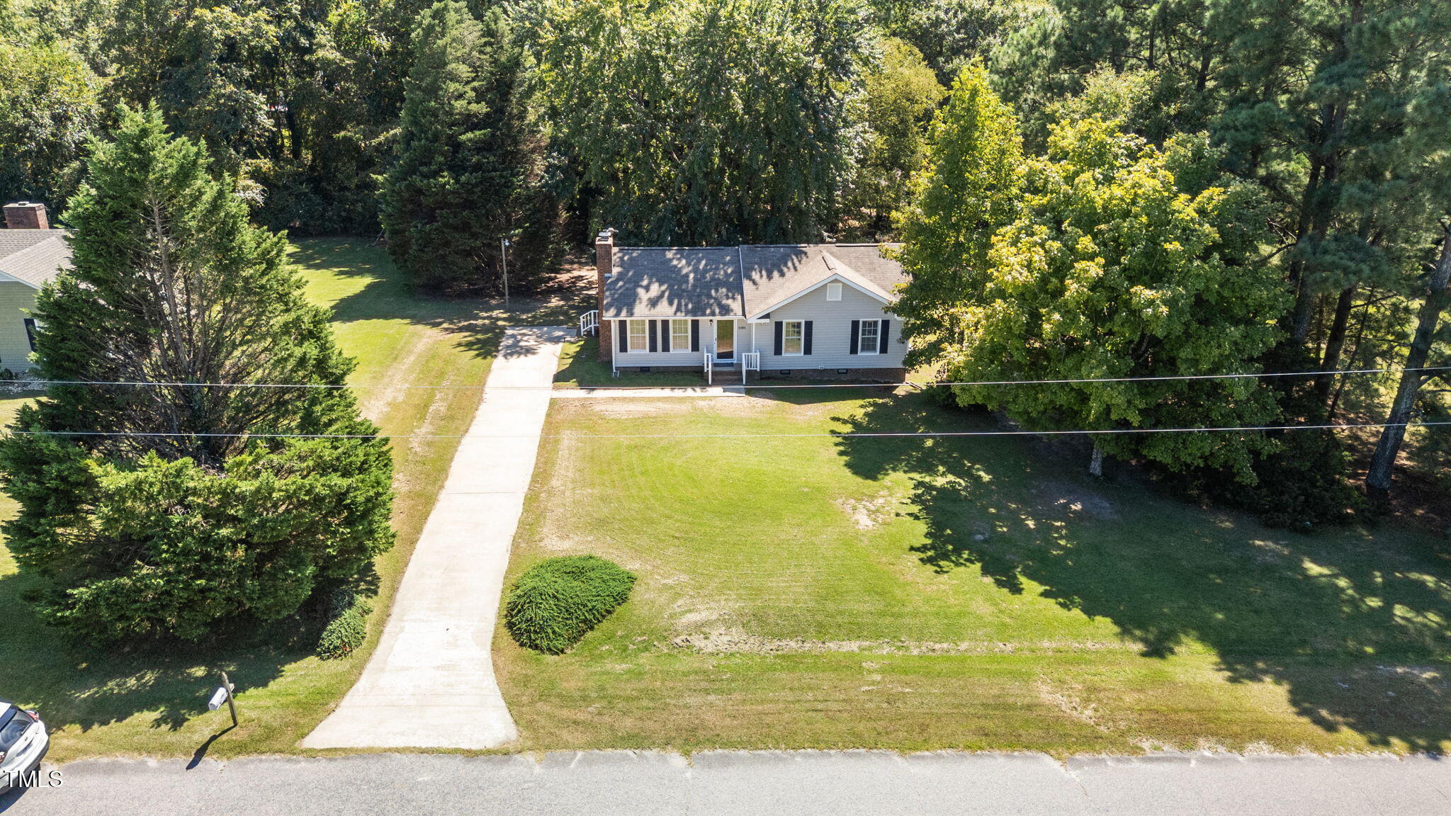 1101 Robinfield Drive Raleigh, NC 27603 - Photo 47 of 48 a view of a swimming pool with a patio