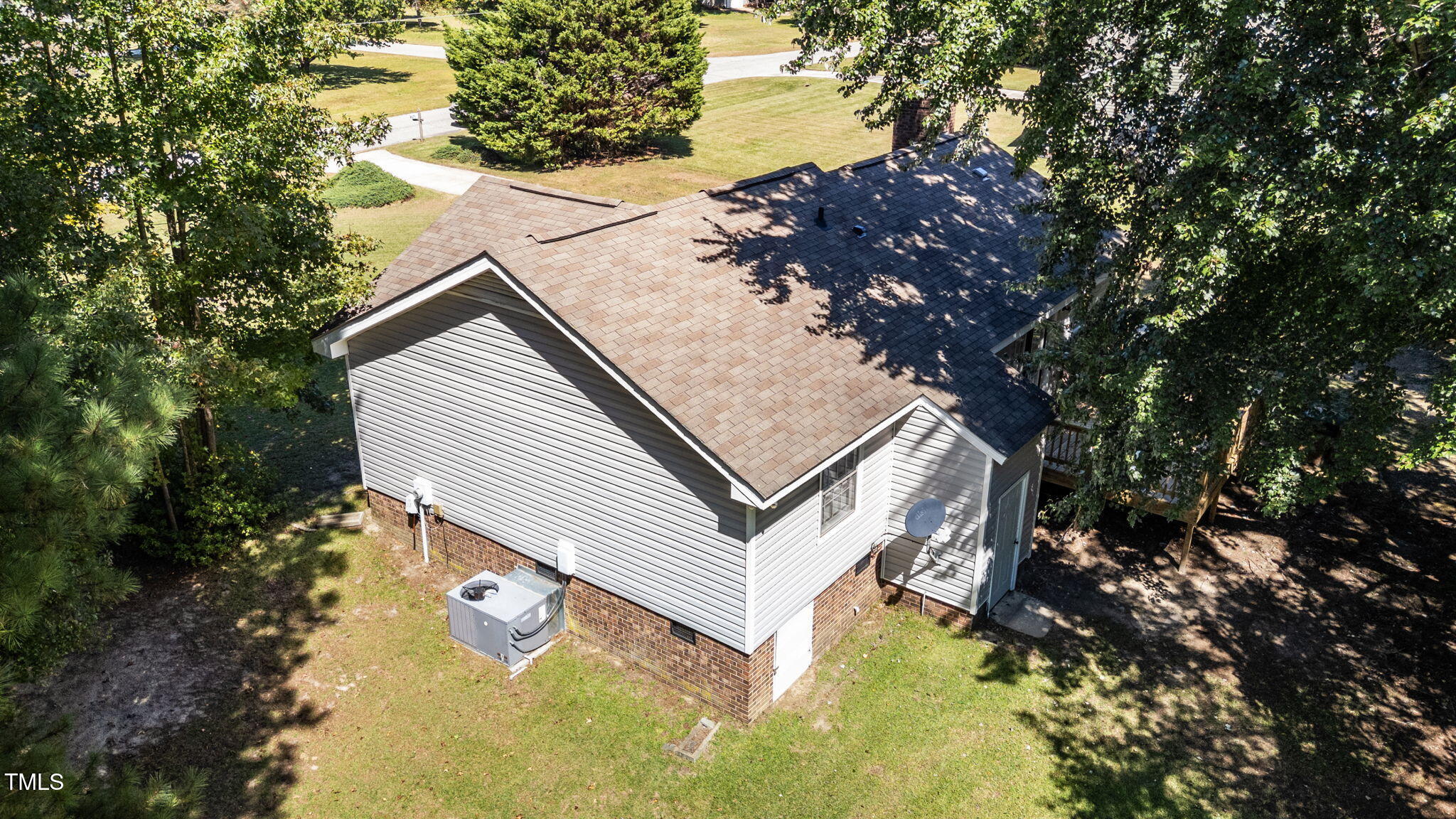 1101 Robinfield Drive Raleigh, NC 27603 - Photo 48 of 48 a view of house with backyard