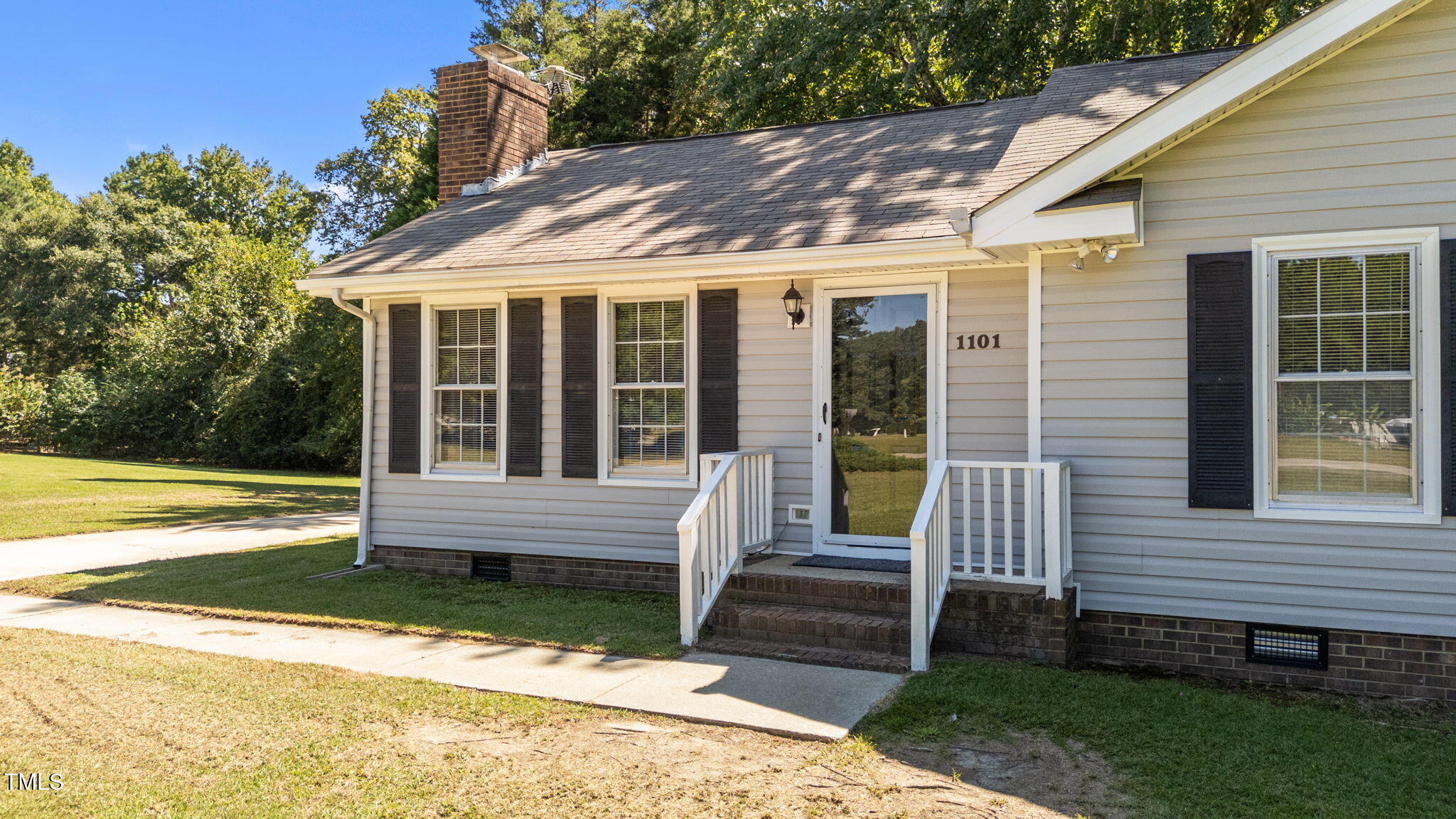 1101 Robinfield Drive Raleigh, NC 27603 - Photo 7 of 48 a view of house with backyard and swimming pool