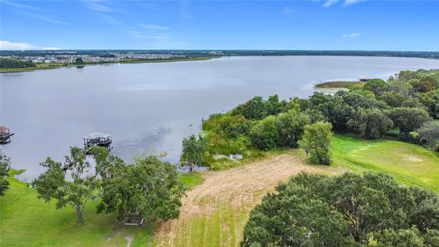 a view of a lake with outdoor space