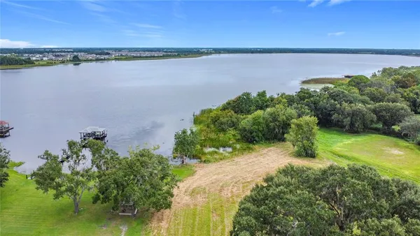 a view of a lake with outdoor space