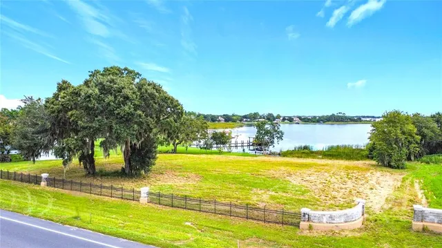a view of a swimming pool with an ocean view