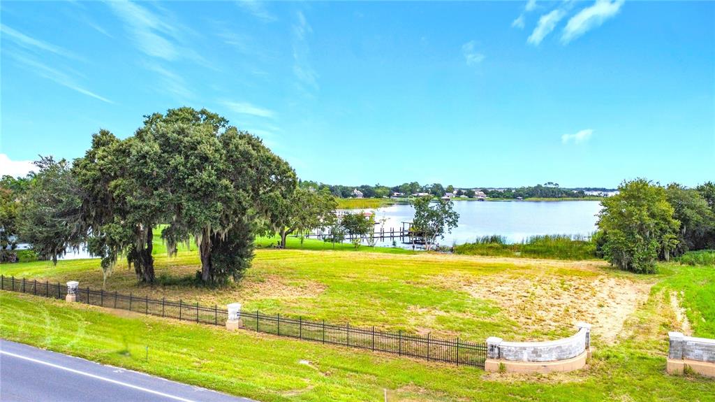 2615 Hickory Tree Road St. Cloud, FL 34771 - Photo 5 of 22 a view of a swimming pool with an ocean view