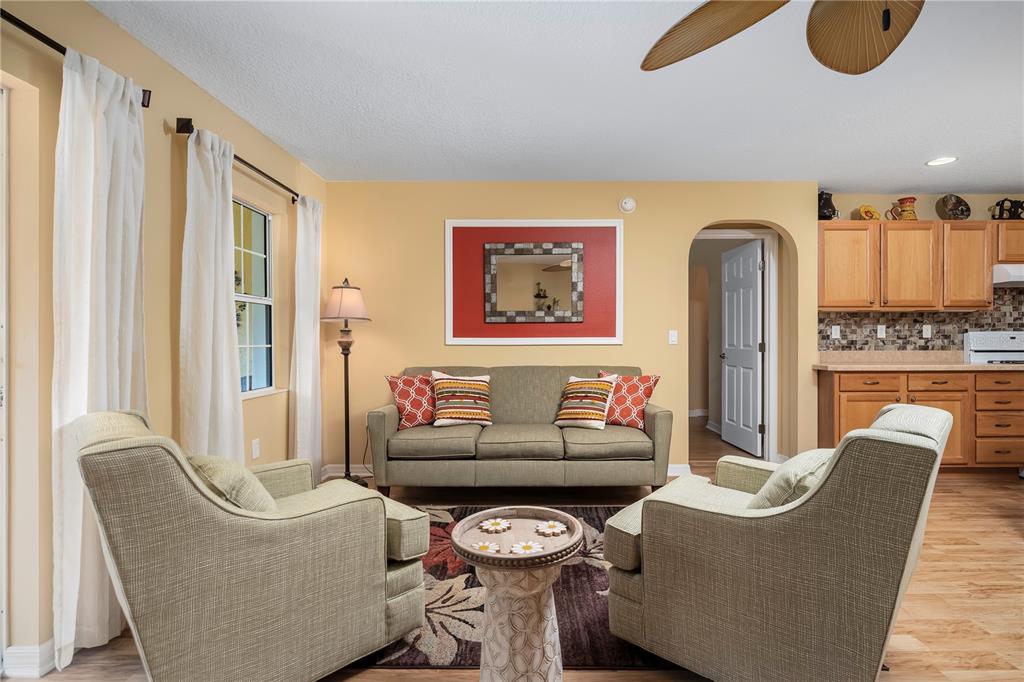 8180 Southwest 80th Terrace Ocala, FL 34476 - Photo 9 of 34 a living room with furniture and a window