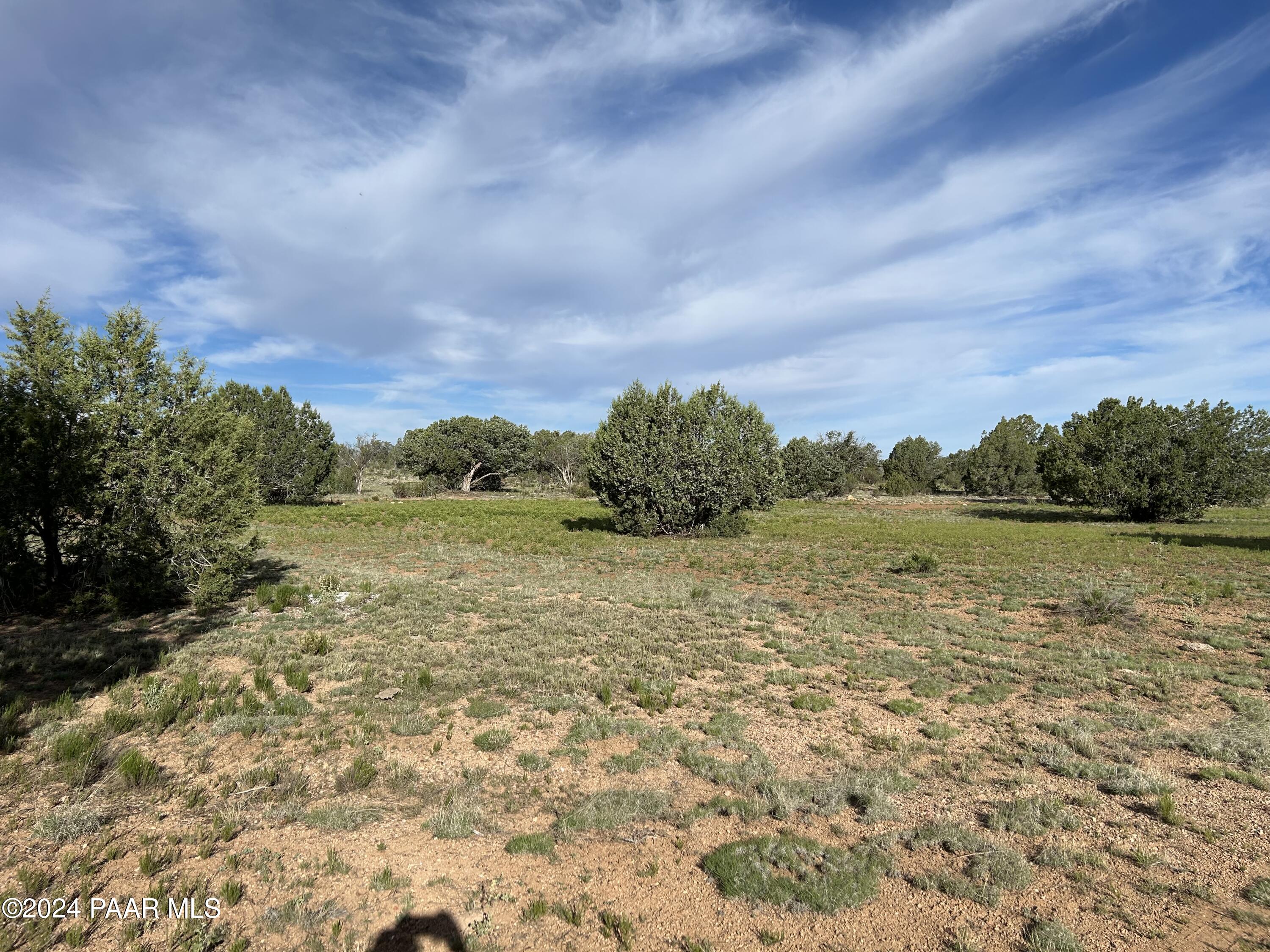 0 Off Pumphouse Road Seligman, AZ 86337 - Photo 3 of 8 a view of a lake with houses in the back
