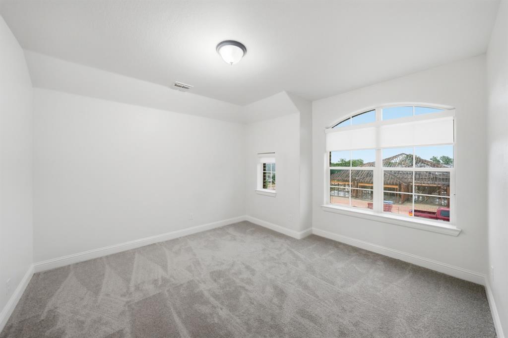 624 Sorrell Road McKinney, TX 75072 - Photo 23 of 28 an empty room with a window