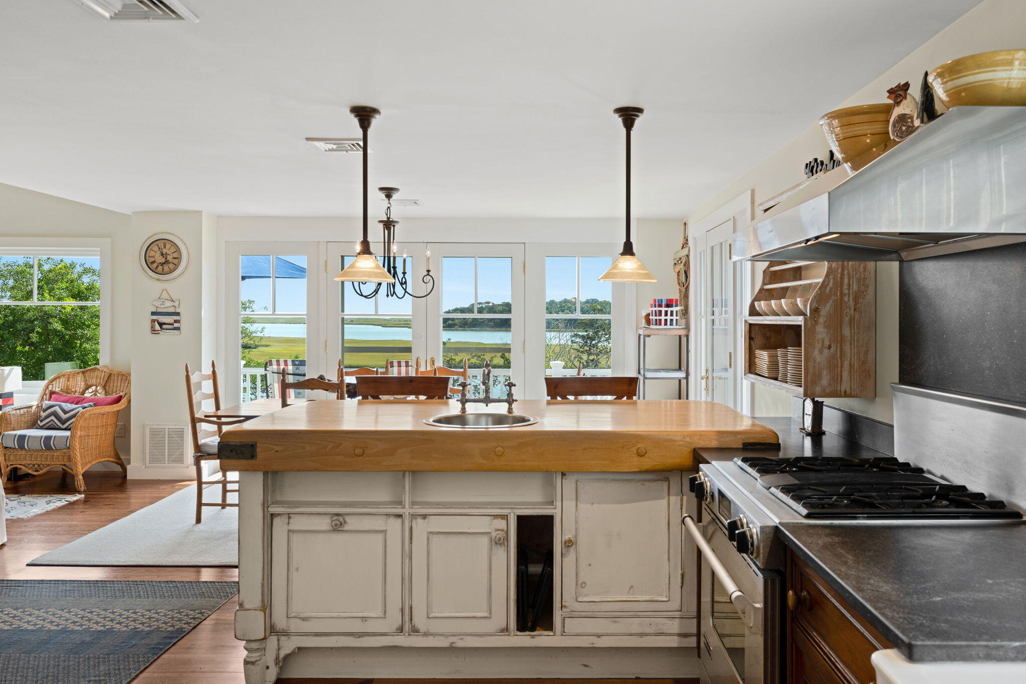 63 Briar Spring Road Orleans, MA 02653 - Photo 11 of 37 a kitchen with stainless steel appliances granite countertop a stove and a sink