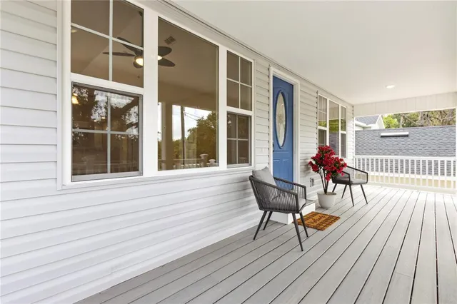 a view of a house with outdoor seating