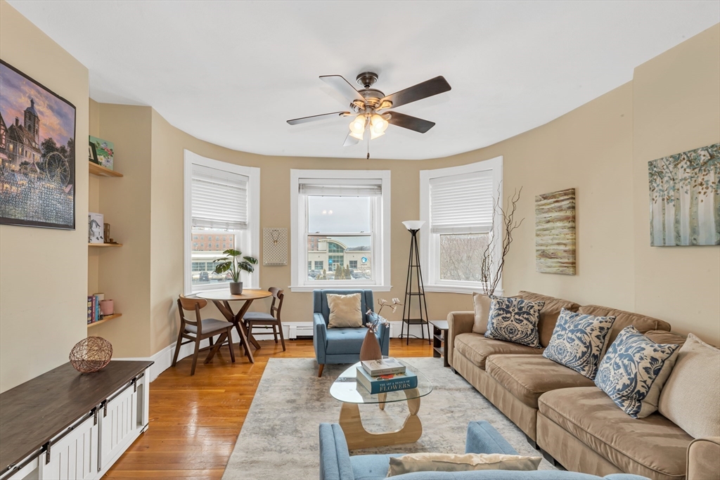 122 Day Street, Unit 3 Boston, MA 02130 - Photo 3 of 14 a living room with furniture and a large window