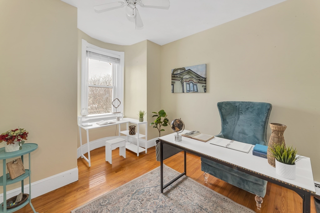122 Day Street, Unit 3 Boston, MA 02130 - Photo 5 of 14 a living room with furniture and a window