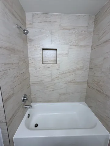 a bathroom with a tub