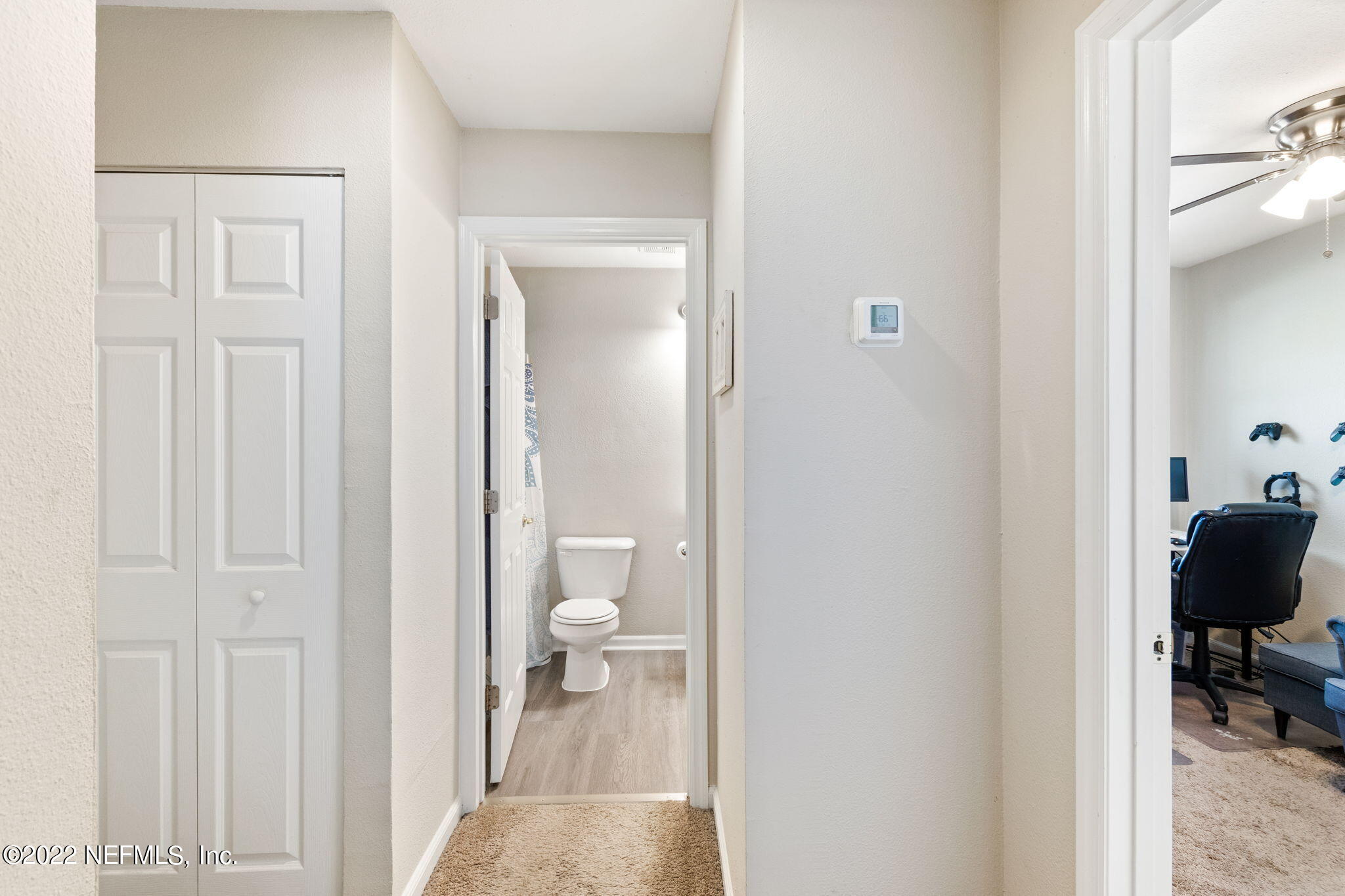 4420 Carter Road, Unit 5 St. Augustine, FL 32086 - Photo 17 of 29 a view of a bathroom from a hallway