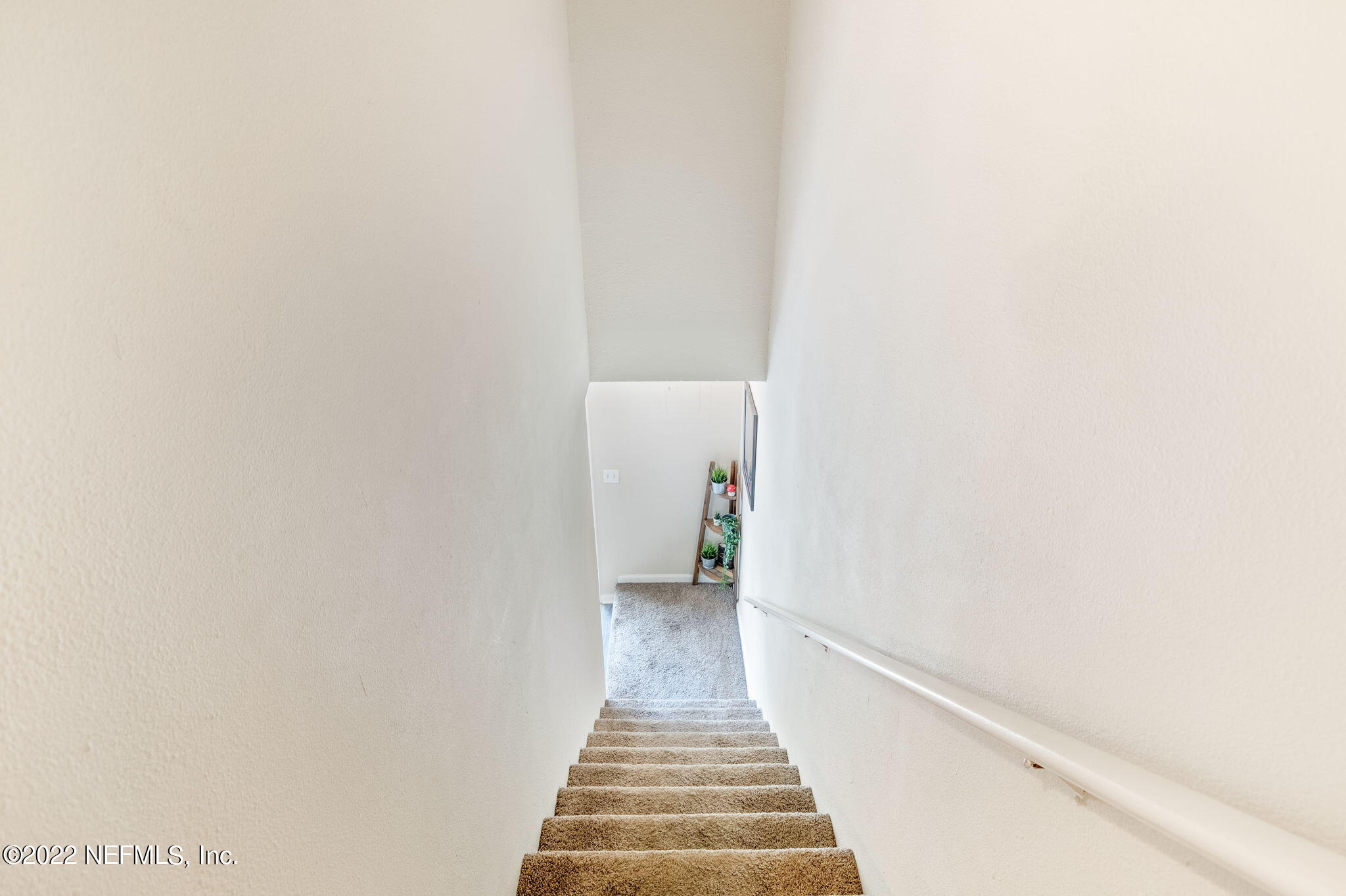 4420 Carter Road, Unit 5 St. Augustine, FL 32086 - Photo 18 of 29 a view of a hallway with wooden floor