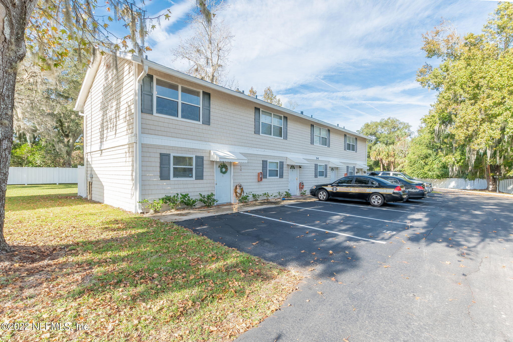 4420 Carter Road, Unit 5 St. Augustine, FL 32086 - Photo 2 of 29 a view of a car parked in front of a house