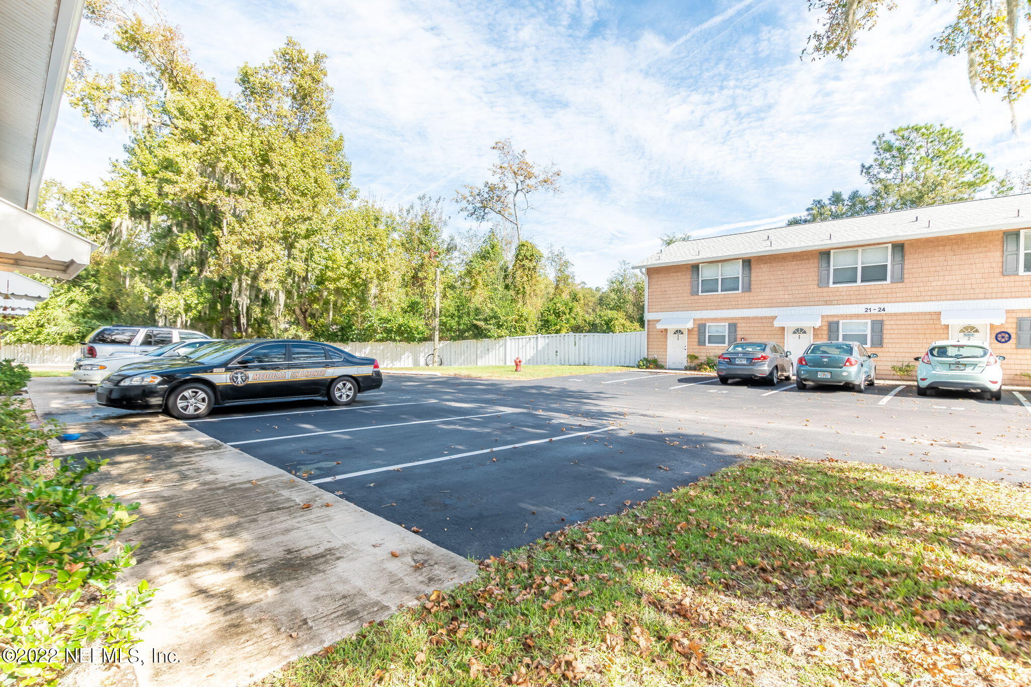 4420 Carter Road, Unit 5 St. Augustine, FL 32086 - Photo 29 of 29 a cars parked on the side of a street